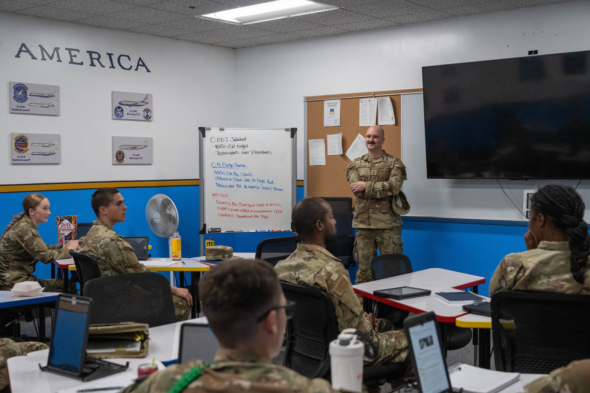 U.S. Air Force Chief Master Sgt. Jonny Adams, 97th Air Mobility Wing command chief, speaks with students at the 344th Training Squadron Career Enlisted Aviator Center of Excellence at Joint Base San Antonio-Lackland, Texas, April 1, 2026. Adams, along with other senior enlisted leaders, spoke with a class, offering guidance and mentorship to newly enlisted Airmen. (U.S. Air Force photo by Airman 1st Class Emma Wright)