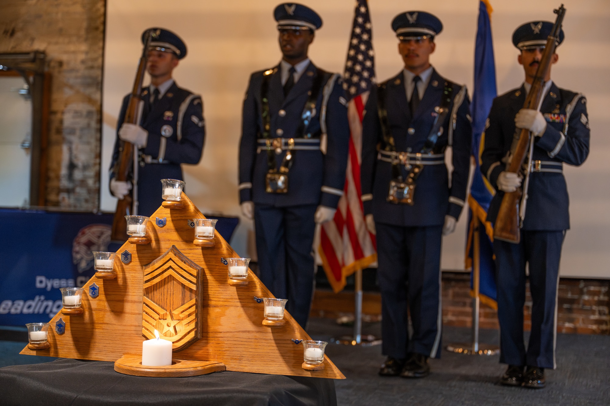 Members of the Dyess Air Force Base Honor Guard present the colors during a Chief Master Sergeant Induction Ceremony in Abilene, Texas, March 28, 2026. The ceremony formally inducted senior noncommissioned officers into the highest enlisted tier, recognizing their leadership, mentorship and commitment to Air Force core values. (U.S. Air Force photo by Airman 1st Class Caleb Schellenberg)