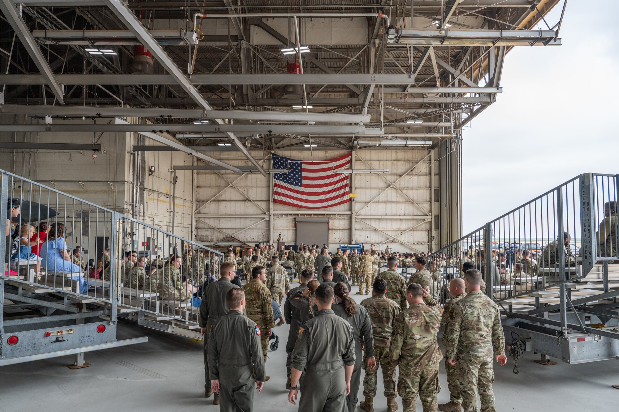U.S. Airmen assigned to the 7th Bomb Wing and 317th Airlift Wing arrive at a Noncommissioned Officer Induction Ceremony at Dyess Air Force Base, Texas, April 3, 2026. The ceremony marked a key enlisted milestone as Airmen transitioned into the NCO corps and accepted increased responsibility. (U.S. Air Force photo by Airman 1st Class Caleb Schellenberg)