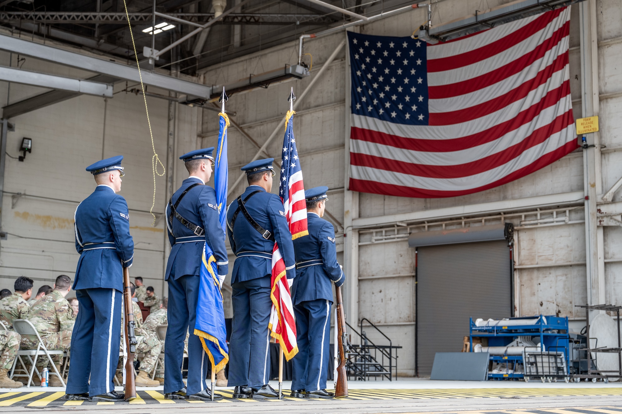 Members of the Dyess Air Force Base Honor Guard prepare to present the colors during a Noncommissioned Officer Induction Ceremony at Dyess Air Force Base, Texas, April 3, 2026.  The ceremony formally recognized Airmen entering the NCO corps and their role in leading and developing the next generation of Airmen. (U.S. Air Force photo by Airman 1st Class Caleb Schellenberg)