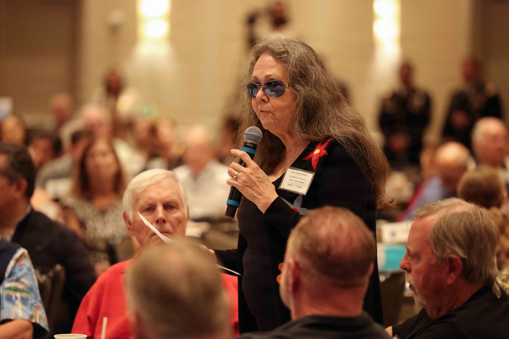 Jody Fochs, next of kin to U.S. Army Pvt. Elmer Blonien, speaks during the Defense POW/MIA Accounting Agency Family Member Update in San Diego, Ca., March 28, 2026.