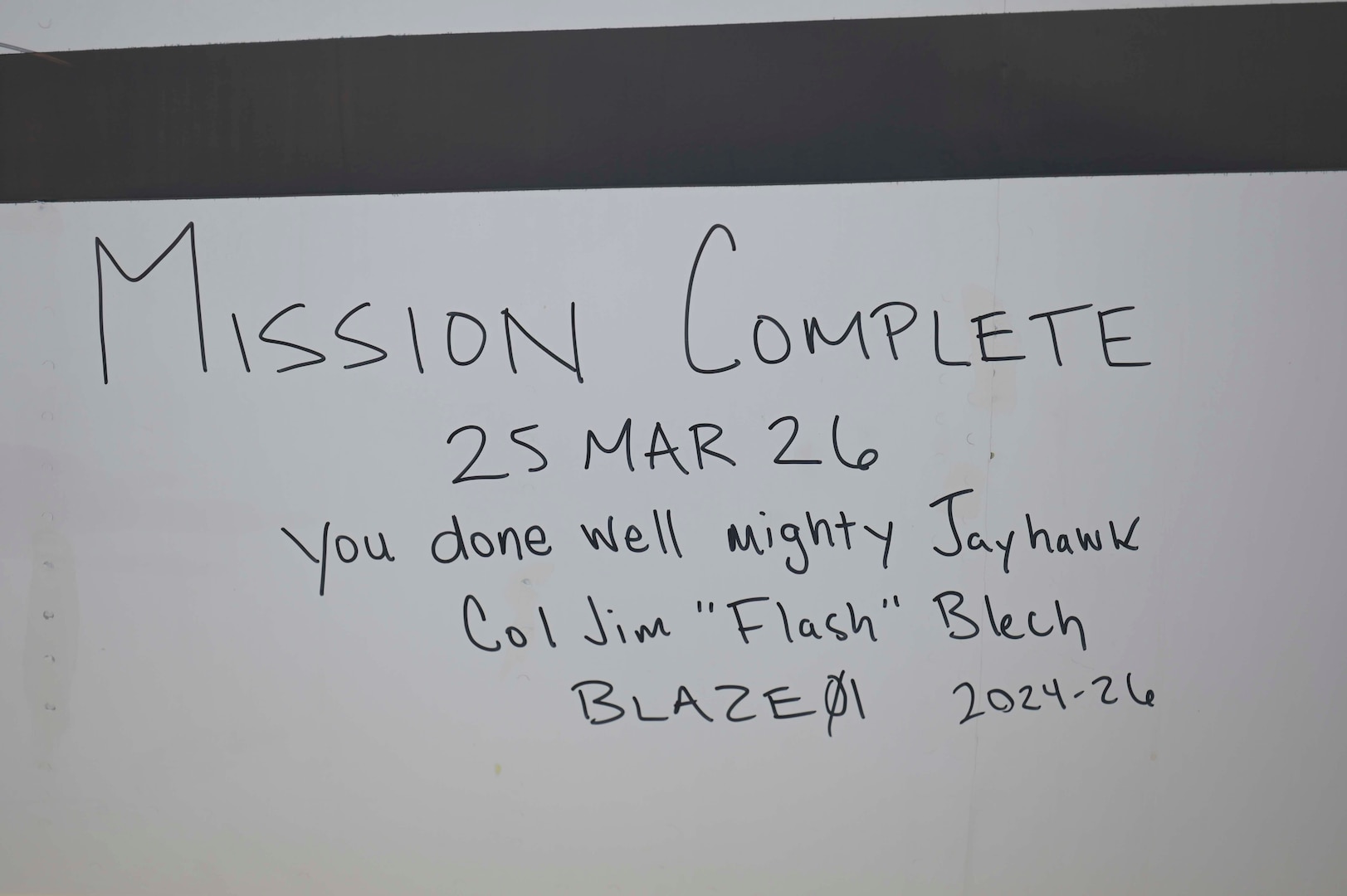 "Mission Complete,” is signed on T-1A Jayhawk tail number 077 by Col. James Blech, 14th Flying Training Wing commander, at Davis-Monthan Air Force Base, Ariz., March 25, 2026.