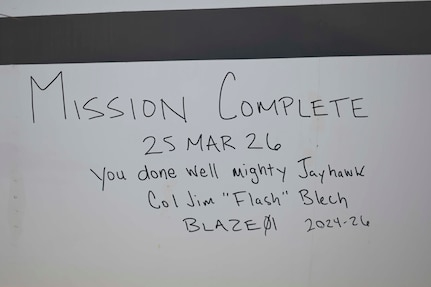 "Mission Complete,” is signed on T-1A Jayhawk tail number 077 by Col. James Blech, 14th Flying Training Wing commander, at Davis-Monthan Air Force Base, Ariz., March 25, 2026.