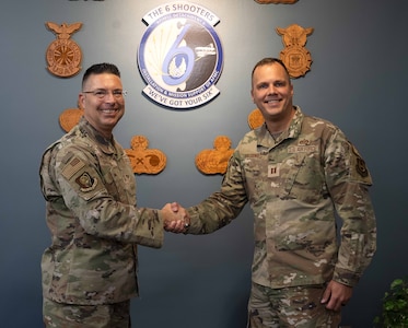 Commander coins Airman