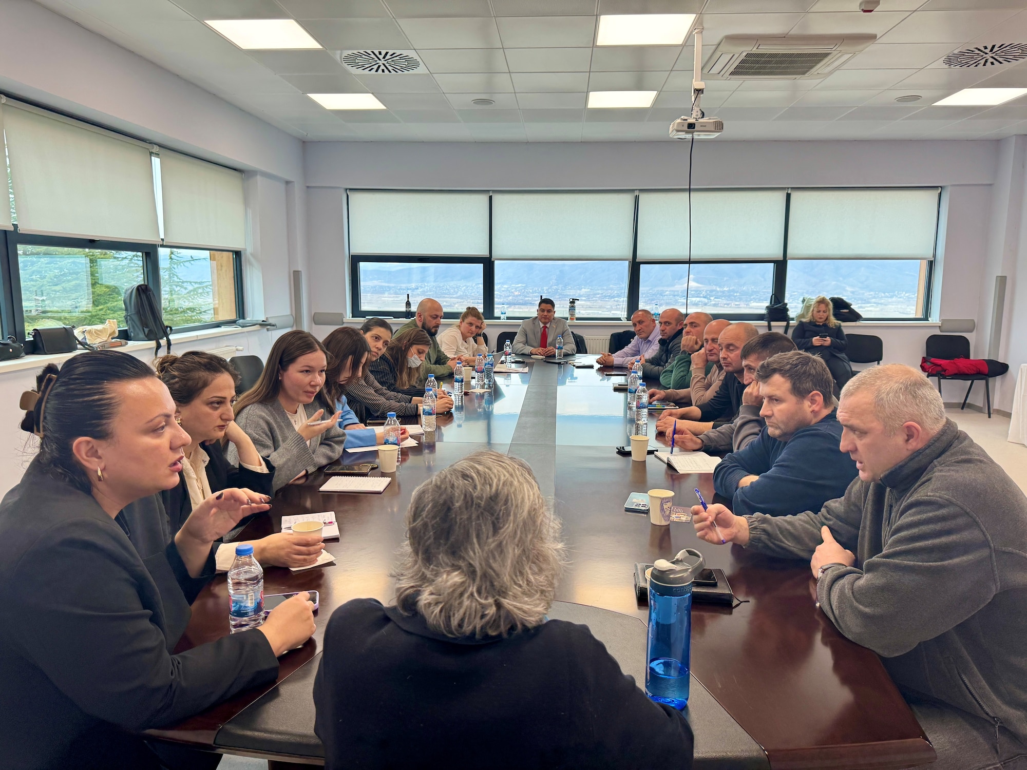 Dr. Amy Adler, Walter Reed Army Institute of Research Europe senior scientist, guides a discussion