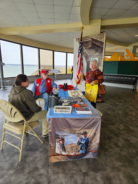 Volunteers helping patrons.