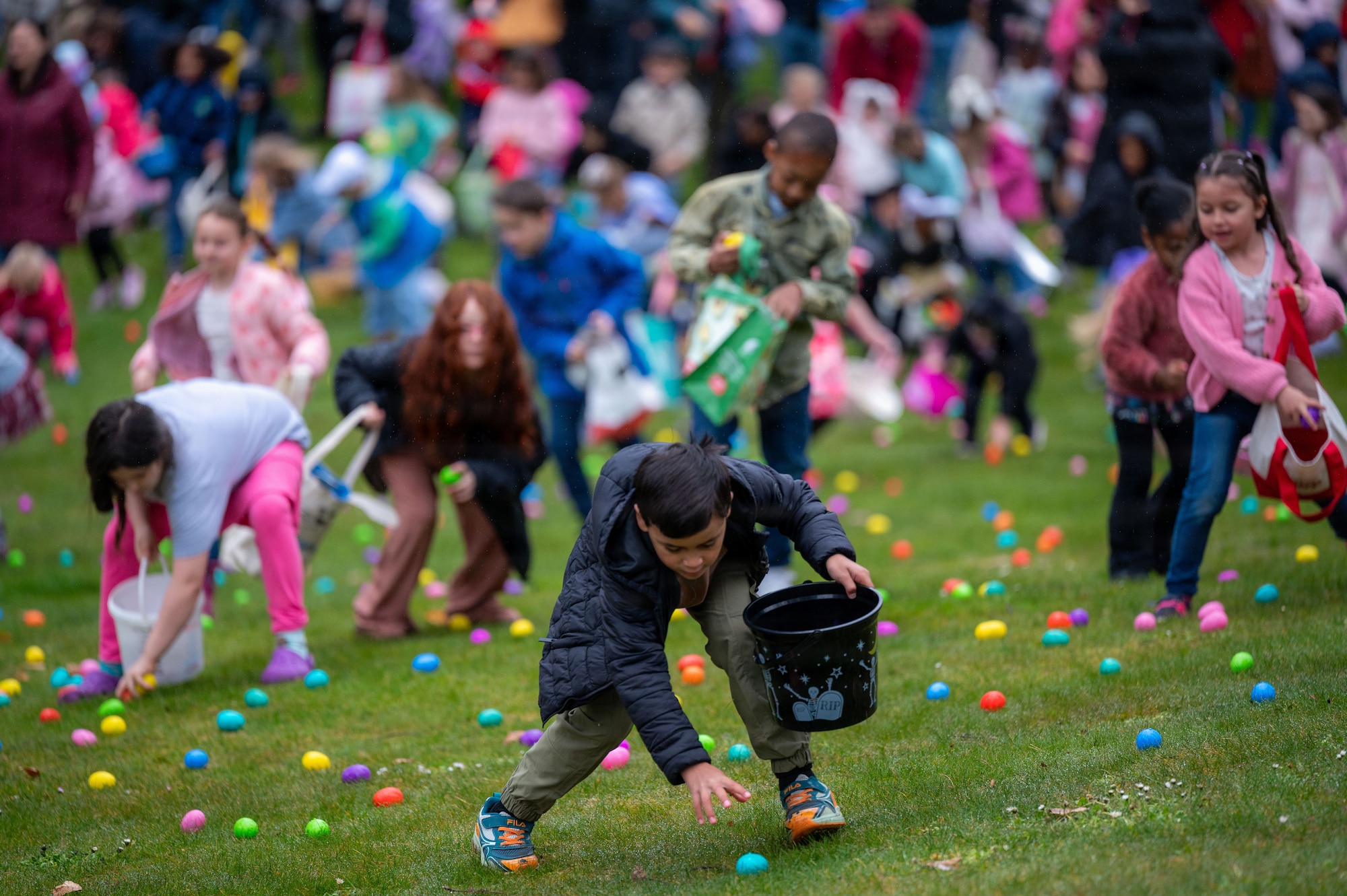 Children participate in an egg hunt during an Easter event at Ramstein Air Base, Germany, April 4, 2026.