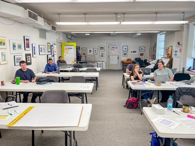 People in a classroom.