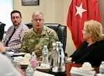 Defense Logistics Agency Director Lt. Gen. Mark Simerly, center, speaks to DLA Disposition Services staff during a recent visit to the Hart-Dole-Inouye Federal Center on April 2.