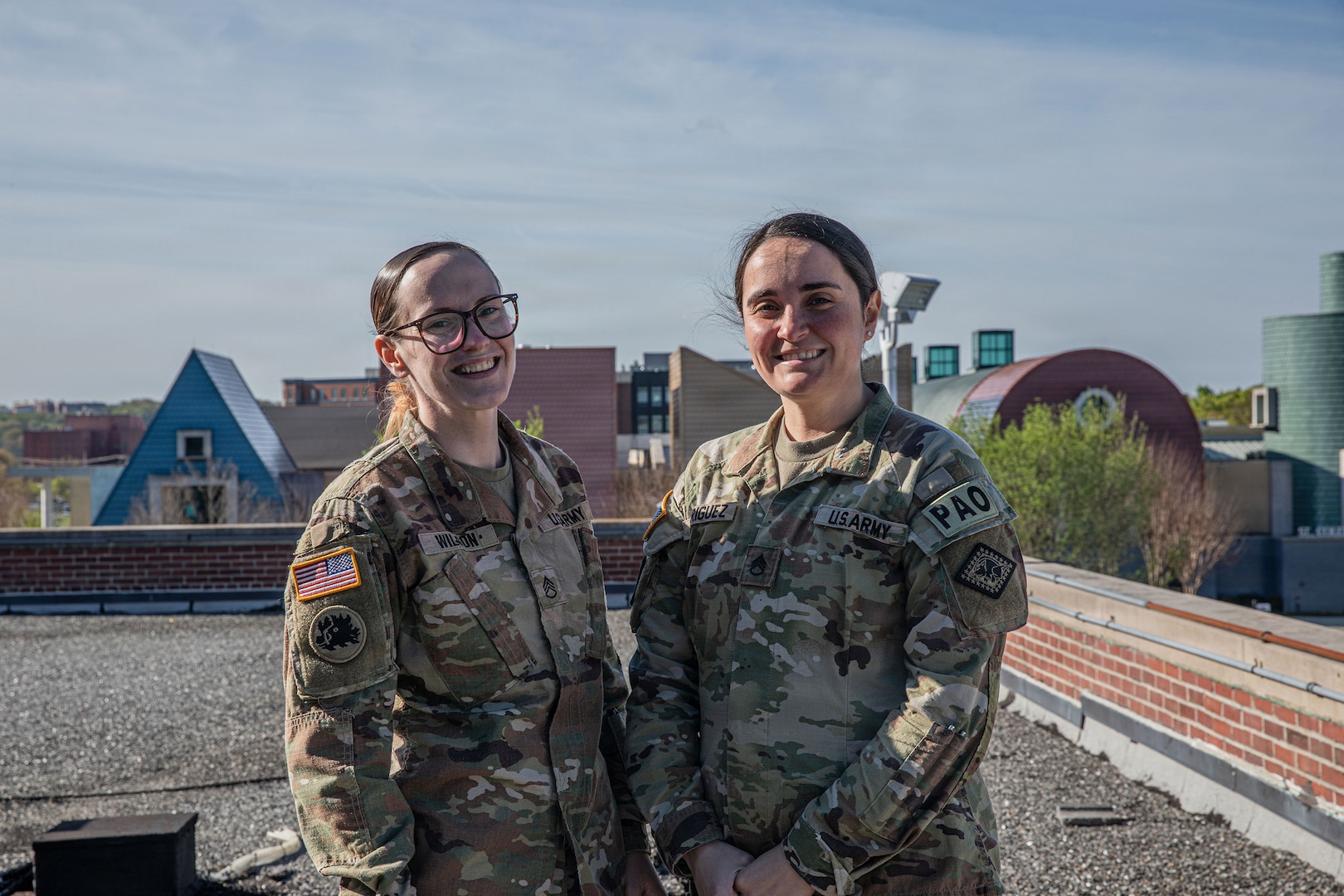 U.S. Army Staff Sgts. Tianna Wilson, Georgia National Guard, and Brianna Rodriguez-Munns, Arkansas National Guard, public affairs noncommissioned officers assigned to Joint Task Force–District of Columbia, provided immediate medical aid to a minor involved in a vehicle-versus-scooter accident in Washington on March 31.
