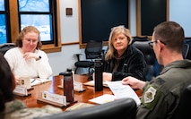 House Armed Services Committee staff members are briefed by U.S. Air Force Col. Thomas Taylor.