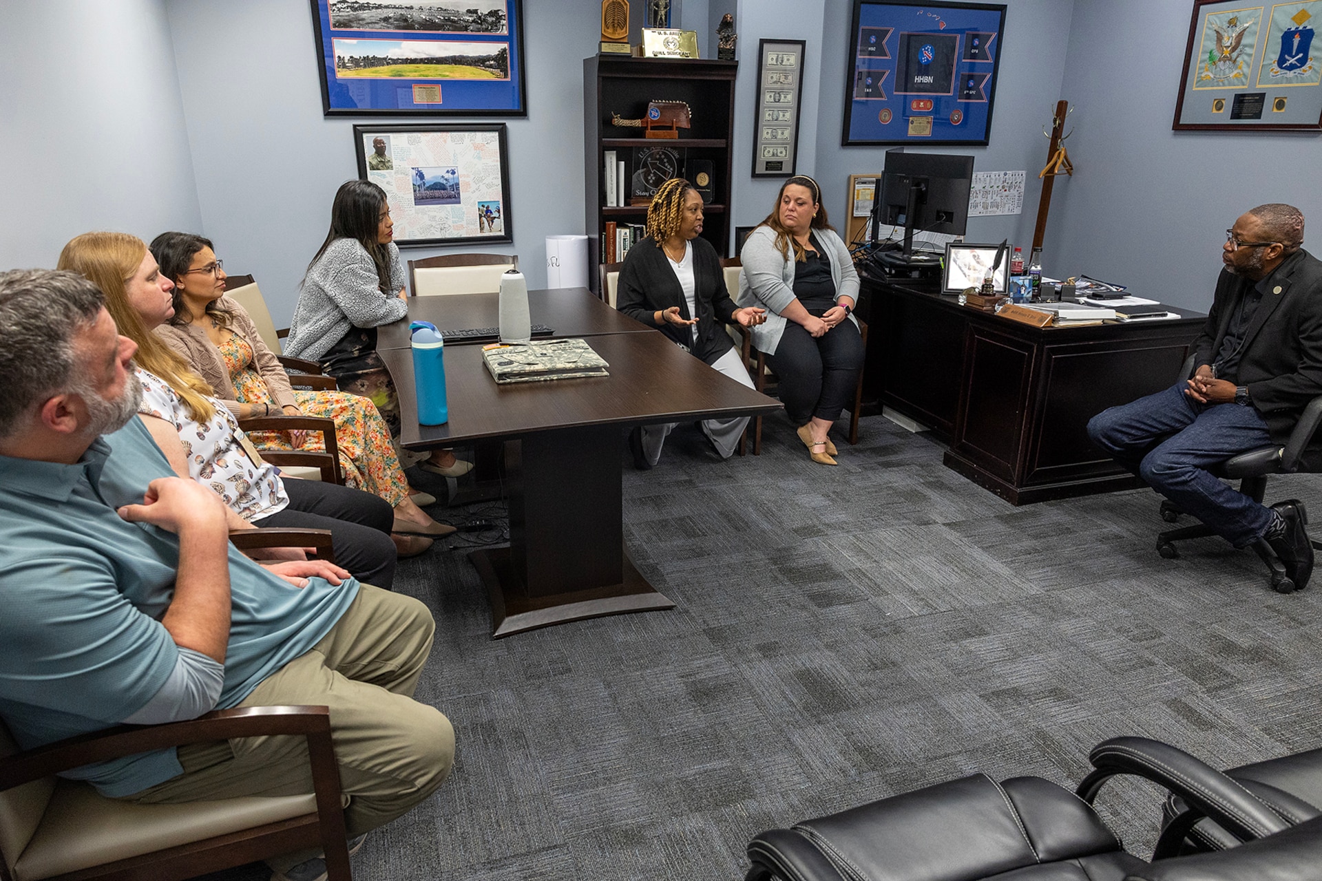Six U.S. Army Financial Management Command Army Military Pay Office employees meet with Gennaro Penn, USAFMCOM Military Pay Operations director, pictured far right, at the Maj. Gen. Emmett J. Bean Federal Center in Indianapolis March 20, 2026. Ten AMPO employees visited USAFMCOM headquarters after attending a reserve pay course, sponsored by the U.S. Army Reserve Center, from March 16-20, 2026, in Indianapolis with the primary objective of enhancing the student’s the military pay knowledge on Army Reserve and Army National Guard pay in the AMPO network. (U.S. Army photo by Mark R. W. Orders-Woempner)