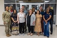 U.S. Army Financial Management Command Army Military Pay Office employees pose for a photo in front of USAFMCOM headquarters at the Maj. Gen. Emmett J. Bean Federal Center in Indianapolis after completing a reserve pay course, sponsored by the U.S. Army Reserve Center, and during a tour of USAFMCOM headquarters and the Defense Finance and Accounting Service March 20, 2026. Pictured from left to right are: Command Sgt. Maj. Joy L. Allen, USAFMCOM senior enlisted advisor; Ronald Houston, Military Pay Operations Readiness Division chief; Diana Stuart, MPO military pay technician from Fort Knox, Kentucky; Amy Randazzo, MPO military pay technician from USAFMCOM headquarters in Indianapolis; Michael Pavinich, MPO internal control technician from the U.S. Military Academy at West Point, New York; Kelly Delia, MPO military pay supervisor from Joint Base Langley-Eustis, Virgina; Kameisha Lundy, MPO military pay technician from Fort Gillem, Georgia; Jessalyn Golgart, MPO military pay technician from Fort Stewart, Georgia; Denise Gallion, USAFMCOM interim deputy to the commander; Kimberly Lawrence, MPO Sustainment and Training Division chief; and Gennaro Penn, MPO director. (U.S. Army photo by Mark R. W. Orders-Woempner)
