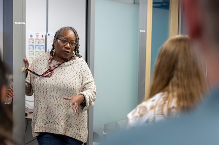 Sharon Booker, Defense Finance and Accounting Service supervisory finance specialist, briefs Army Military Pay Office employees at the Maj. Gen. Emmett J. Bean Federal Center in Indianapolis March 20, 2026. After completing a reserve pay course, the AMPO employees toured both the U.S. Army Financial Management Command’s headquarters and DFAS to gain a better understanding of how the two organizations work together to support Soldiers and their families across the Army. (U.S. Army photo by Mark R. W. Orders-Woempner)