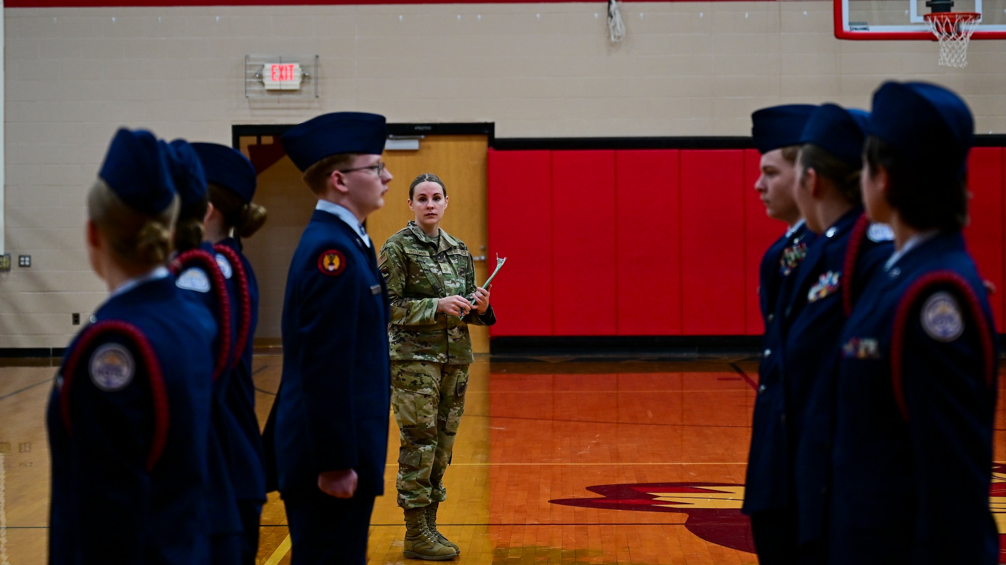 Master Sgt. Deana Heitzman observes cadets during the Air Force Association Regional drill competition.