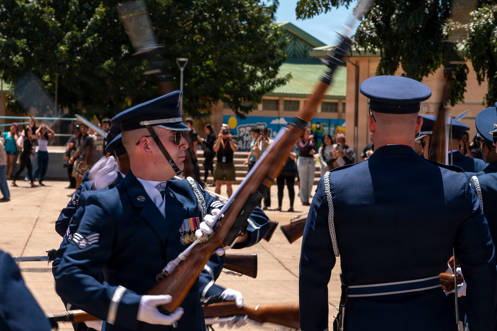 Kapolei High School students watch the U.S. Air Force Honor Guard Drill Team perform at Kapolei High School, Kapolei, Hawaii, March 30, 2026. The performance marked the first of six school performances on the team’s tour of Oahu. (U.S. Air Force photo by Staff Sgt. Jordan Powell)