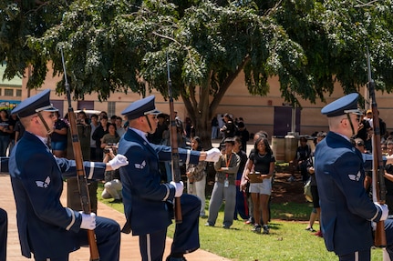 Kapolei High School students watch the U.S. Air Force Honor Guard Drill Team perform at Kapolei High School, Kapolei, Hawaii, March 30, 2026.  The team encouraged students to interact with the drill team after the performance for the team members to share stories of their active-duty experiences. (U.S. Air Force photo by Staff Sgt. Jordan Powell)