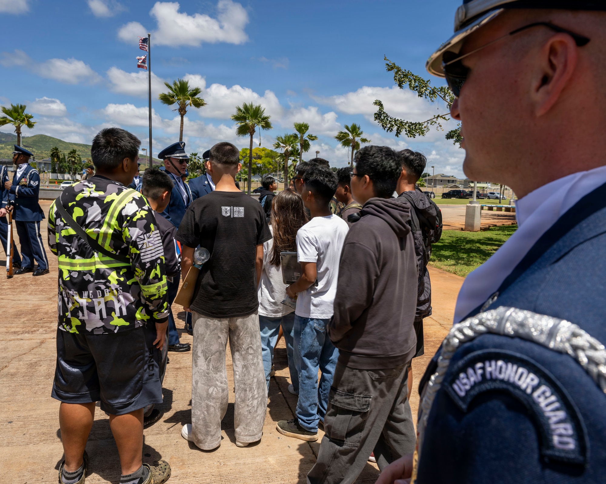 U.S. Air Force Senior Airman Aidan Coffey speaks to Kapolei High School Junior Reserve Officer Training Corps cadets in Kapolei, Hawaii, March 30, 2026. The cadets met Coffey at the Pacific Regional Drill Meet March 28 and ran to meet him again after the school performance. (U.S. Air Force photo by Staff Sgt. Jordan Powell)