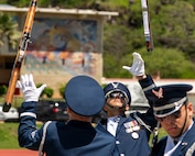 U.S. Air Force Senior Airman Wijeury Collado, U.S. Air Force Honor Guard Ceremonial Guardsman, exchanges rifles in an overhead toss during a performance in Kalani, Hawaii, April 1, 2026. The U.S. Air Force Honor Guard Drill Team performed for the Coast Guard Junior Reserve Officer Training Corps at Kalani High School, one of 16 Coast Guard JROTC units in the U.S. (U.S. Air Force photo by Staff Sgt. Jordan Powell)