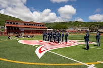 The U.S. Air Force Honor Guard Drill Team performs in Kalani, Hawaii, April 1, 2026. Members of the Drill Team performed for the Coast Guard Junior Reserve Officer Training Corps at Kalani High School, one of 16 Coast Guard JROTC units in the U.S. (U.S. Air Force photo by Staff Sgt. Jordan Powell)