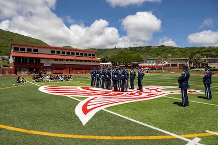 The U.S. Air Force Honor Guard Drill Team performs in Kalani, Hawaii, April 1, 2026. Members of the Drill Team performed for the Coast Guard Junior Reserve Officer Training Corps at Kalani High School, one of 16 Coast Guard JROTC units in the U.S. (U.S. Air Force photo by Staff Sgt. Jordan Powell)