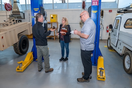 Photo of a safety inspection in warehouse garage
