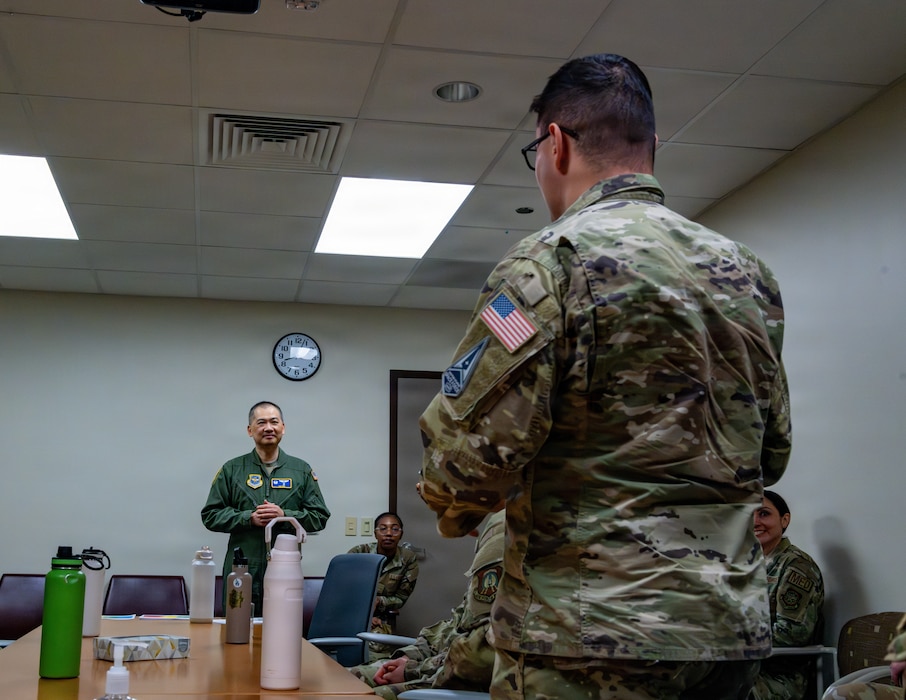 Commander answers cadet's question during a tour