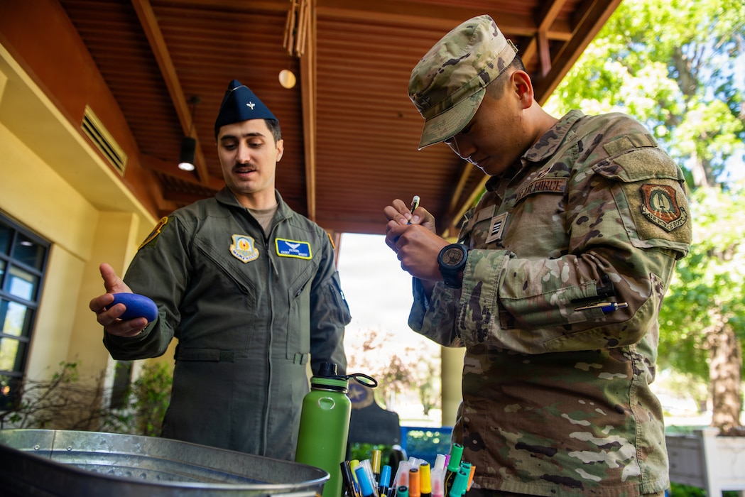 Cadets decorate stones during tour