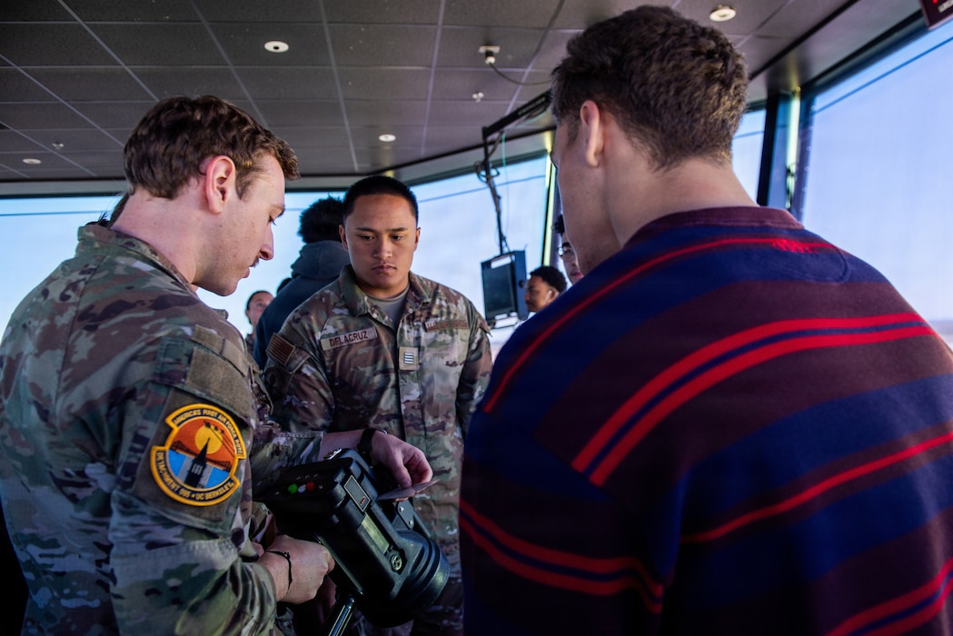 Cadets view air traffic control equipment during tour