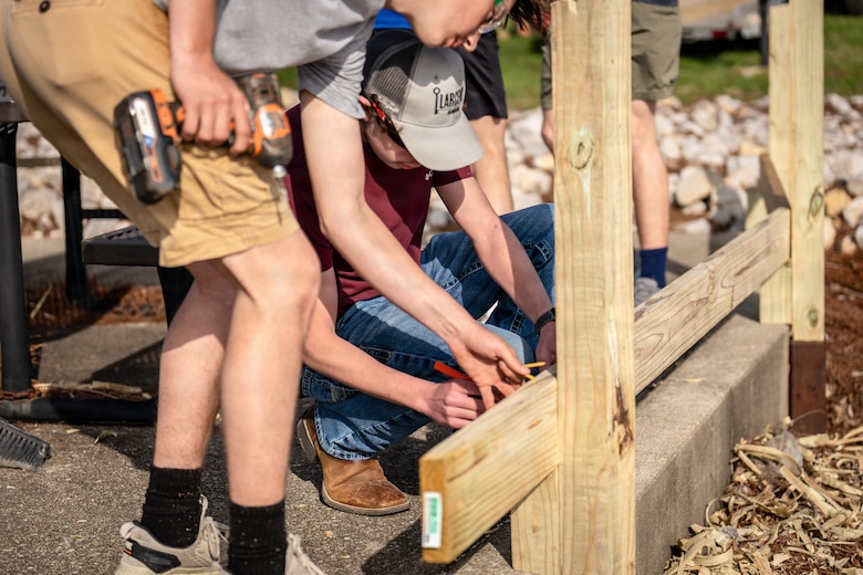Students from the Northeast Dubois High School Building and Trades class reconstruct a wooden fence and railing at a scenic overlook, March 31, 2026 at Patoka Lake in Dubois, Indiana. The class coordinated with the U.S. Army Corps of Engineers, Louisville District and lake staff to replace the aging infrastructure. The project provides students with hands-on construction experience while fostering community ownership.