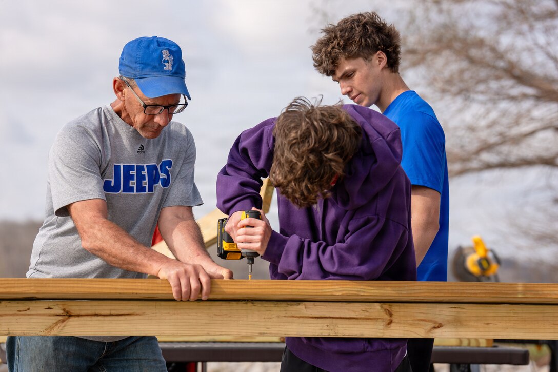 Students from the Northeast Dubois High School Building and Trades class reconstruct a wooden fence and railing at a scenic overlook, March 31, 2026 at Patoka Lake in Dubois, Indiana. The class coordinated with the U.S. Army Corps of Engineers, Louisville District and lake staff to replace the aging infrastructure. The project provides students with hands-on construction experience while fostering community ownership.