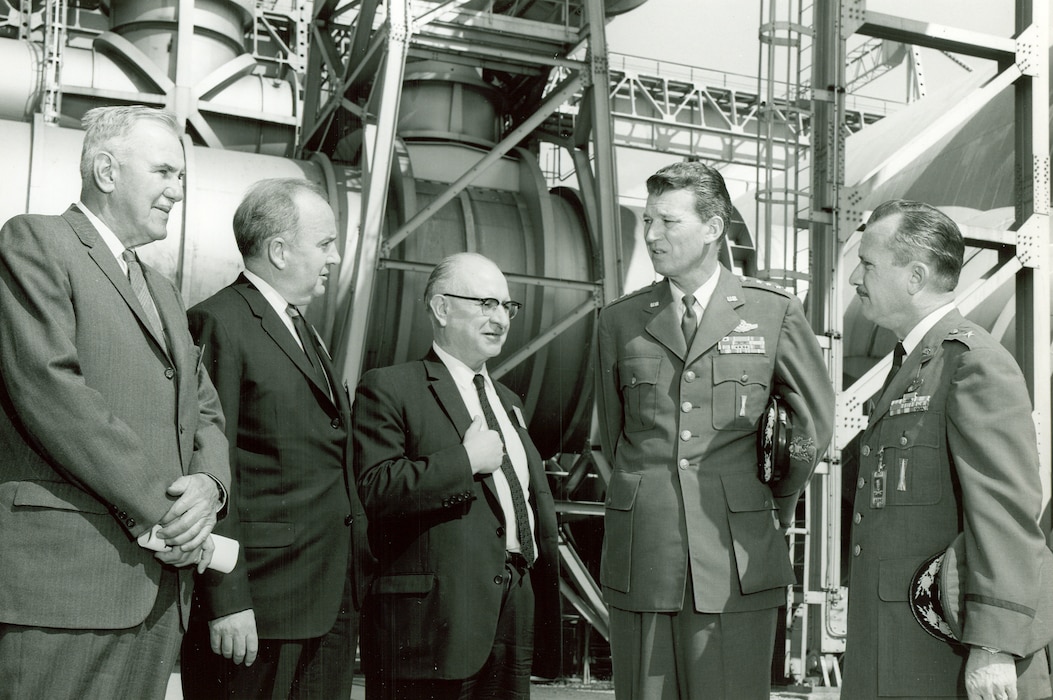 Retired Maj. Gen. Franklin O. Carroll, R.M. Williams, Frank Wattendorf, Gen. Bernard Schriever and then-Arnold Engineering Development Center Commander Brig Gen. Lee Gossick, pictured from left, tour a wind tunnel facility at AEDC on Arnold Air Force Base, Tenn., in 1965. Carroll was the first commander of AEDC and is credited with helping to bring the installation to fruition. (U.S. Air Force photo)