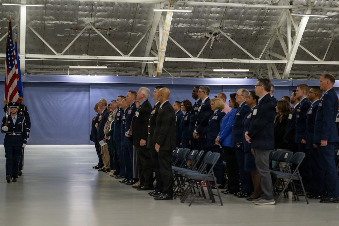 The Joint Base Andrews Honor Guard presents the colors during the 2026 Honorary Commanders Induction Ceremony.