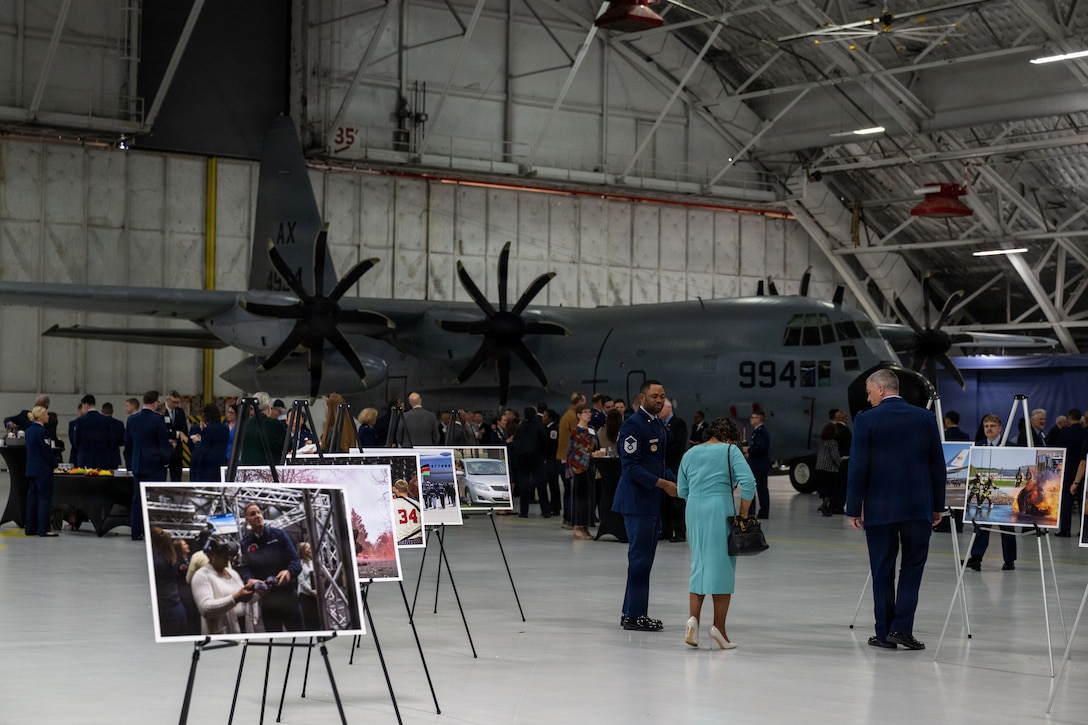 Civic and military leaders mingle before the 2026 Honorary Commander Induction Ceremony.