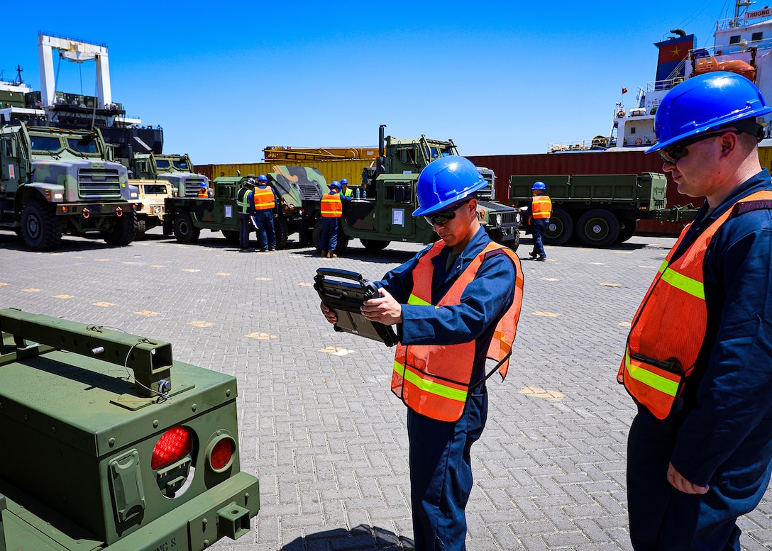 U.S. Marines  assigned to I Marine Expeditionary Force use a Marine Corps Platform Integration Center tablet to track equipment during a maritime prepositioning force offload March 14, 2026, at the Port of Cagayan de Oro, Philippines. MCPIC, developed by Blount Island Command, provides real-time visibility of equipment movement and supports accountability and distribution operations. The operation supported the rapid distribution of forward-positioned equipment for Exercise Balikatan 2026 and demonstrated how prepositioning processes support distributed sustainment by conducting offload, distribution and regeneration across afloat platforms, ashore nodes and transportation networks. Balikatan is a longstanding annual exercise between the Armed Forces of the Philippines and the U.S. military designed to strengthen the alliance, improve combined capabilities and demonstrate commitment to regional security and stability. (U.S. Marine Corps photo by Cpl. Nicholas Martinez)