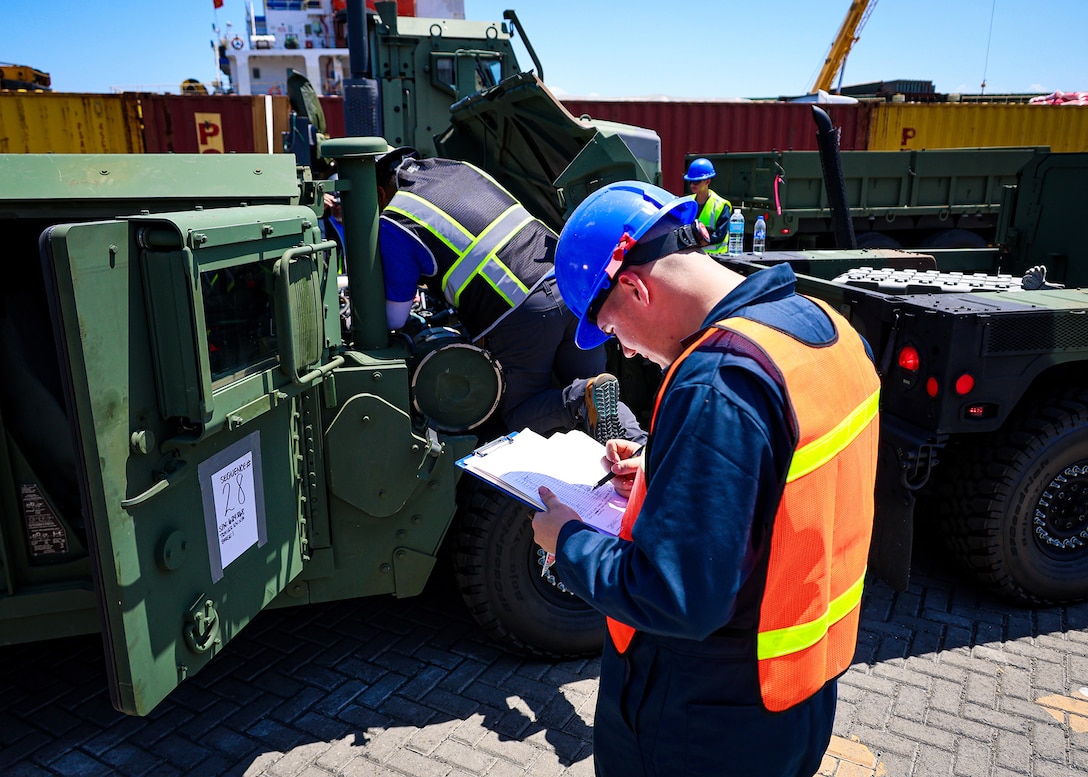 A U.S. Marine assigned to I Marine Expeditionary Force conducts a joint limited technical inspection during a maritime prepositioning force offload March 14, 2026, at the Port of Cagayan de Oro, Philippines. The operation supported the rapid distribution of forward-positioned equipment for Exercise Balikatan 2026 and demonstrated how prepositioning processes support distributed sustainment by conducting offload, distribution and regeneration across afloat platforms, ashore nodes and transportation networks. Balikatan is a longstanding annual exercise between the Armed Forces of the Philippines and the U.S. military designed to strengthen the alliance, improve combined capabilities and demonstrate commitment to regional security and stability. (U.S. Marine Corps photo by Cpl. Nicholas Martinez)