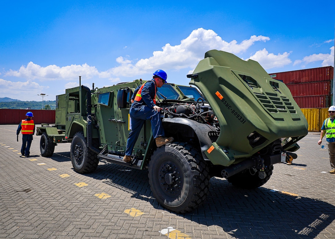 U.S. Marines assigned to I Marine Expeditionary Force conduct a joint limited technical inspection during a maritime prepositioning force offload March 14, 2026, at the Port of Cagayan de Oro, Philippines. The operation supported the rapid distribution of forward-positioned equipment for Exercise Balikatan 2026 and demonstrated how prepositioning processes support distributed sustainment by conducting offload, distribution and regeneration across afloat platforms, ashore nodes and transportation networks. Balikatan is a longstanding annual exercise between the Armed Forces of the Philippines and the U.S. military designed to strengthen the alliance, improve combined capabilities and demonstrate commitment to regional security and stability. (U.S. Marine Corps photo by Cpl. Nicholas Martinez)