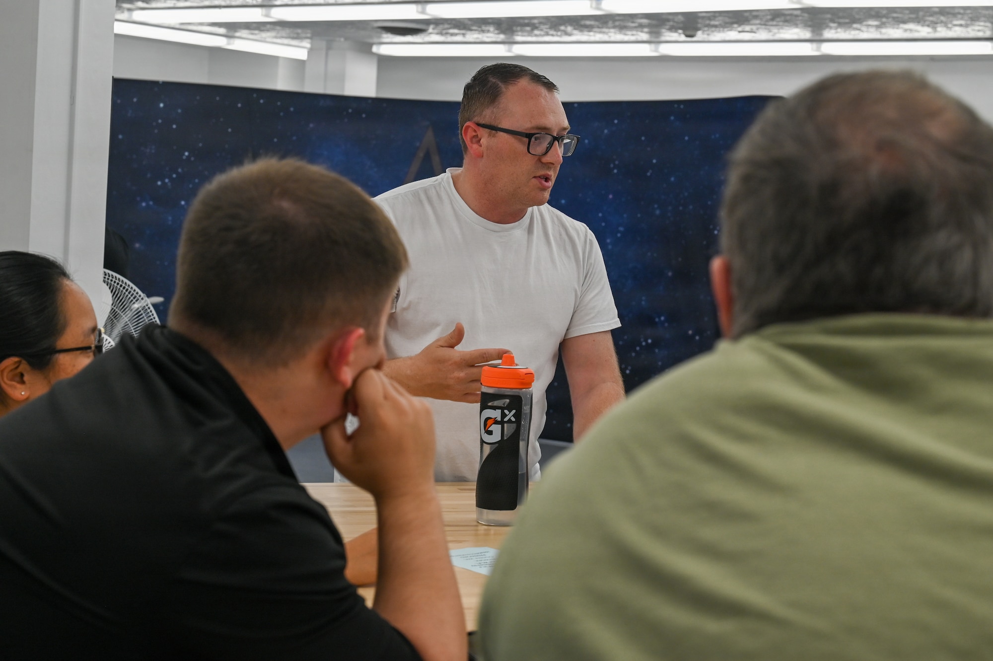 U.S. Air Force Tech. Sgt. Phillip Noe, 2nd Space Launch Squadron mission assurance technician, speaks to his team.