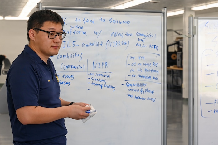 U.S. Space Force Capt. Taeklim Kim, 2nd Space Launch Squadron vulcan flight chief engineer, addresses his team.