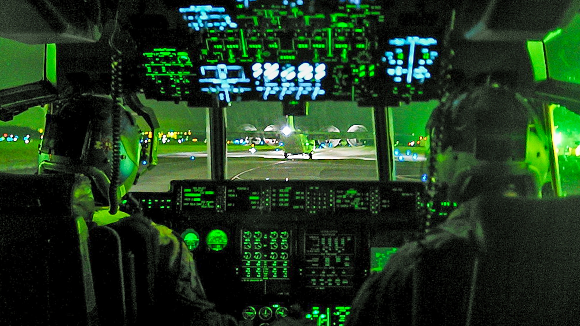 U.S. Air Force MC-130J Commando IIs assigned to the 353rd Special Operations Wing, taxi after landing at Kadena Air Base, Japan.