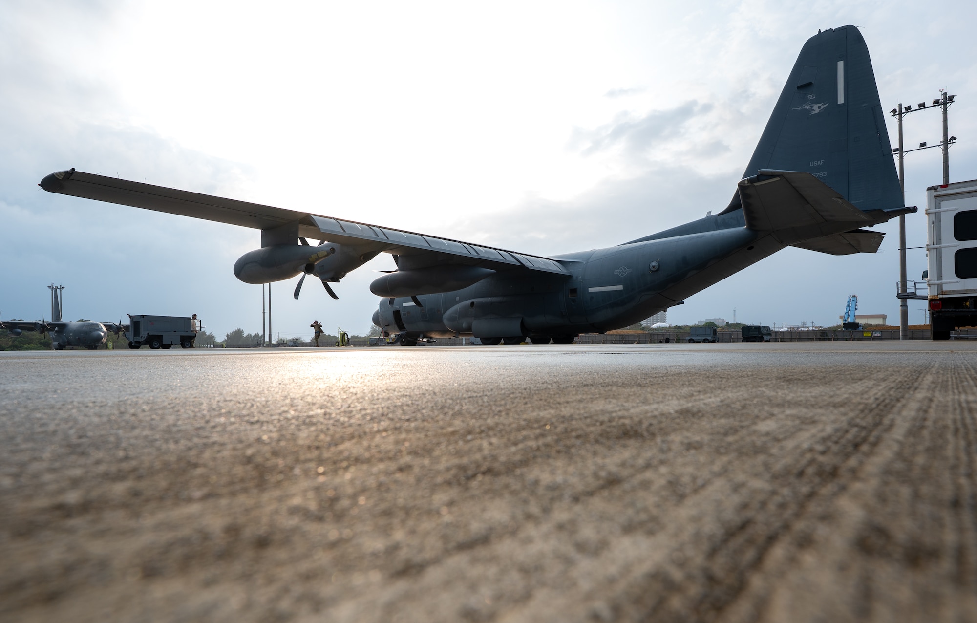 A U.S. Air Force MC-130J Commando II assigned to the 353rd Special Operations Wing sits on the flight line before takeoff at Kadena Air Base, Japan.
