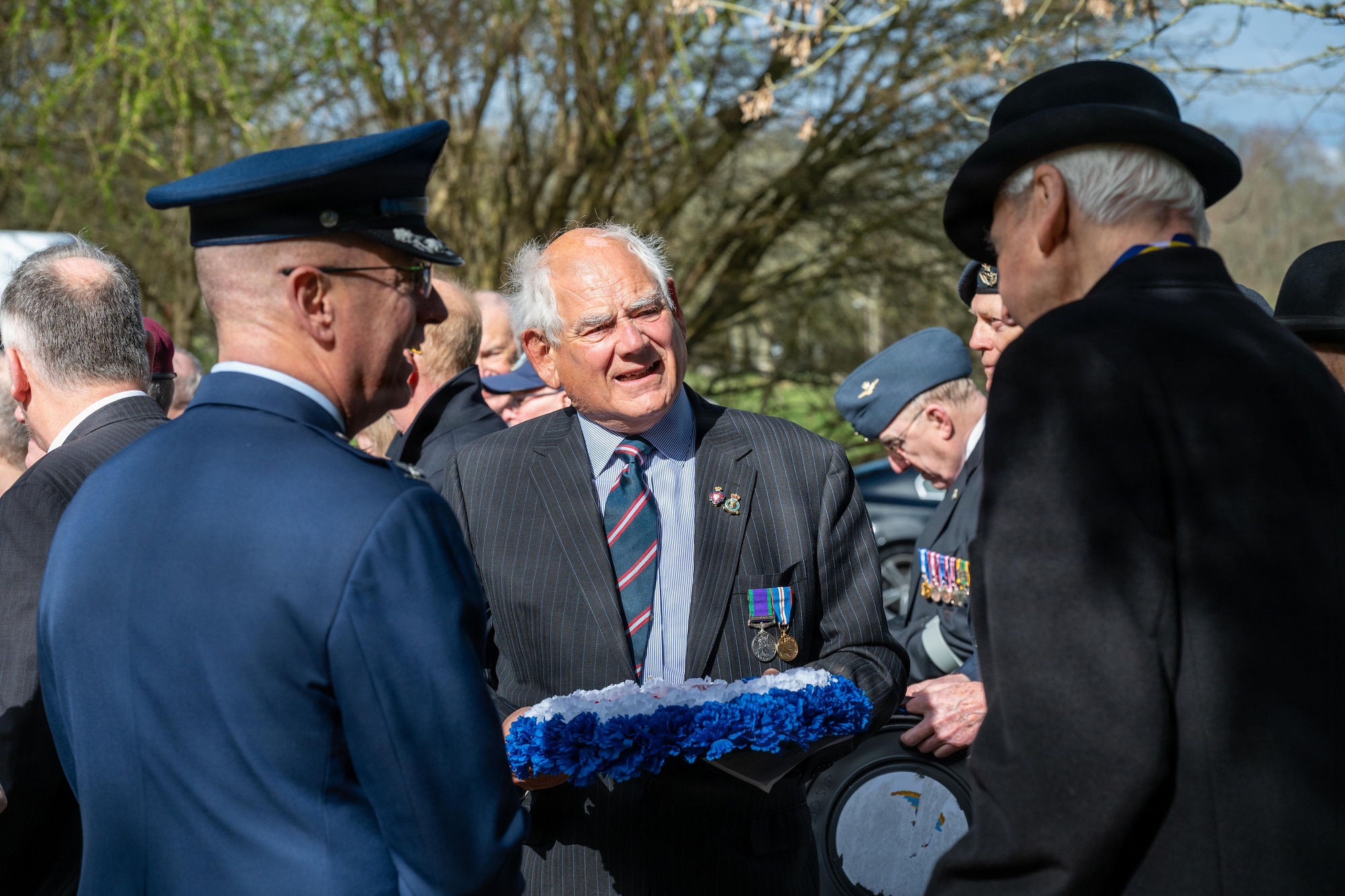 Members of the 501st Combat Support Wing and the local community gather for a memorial service