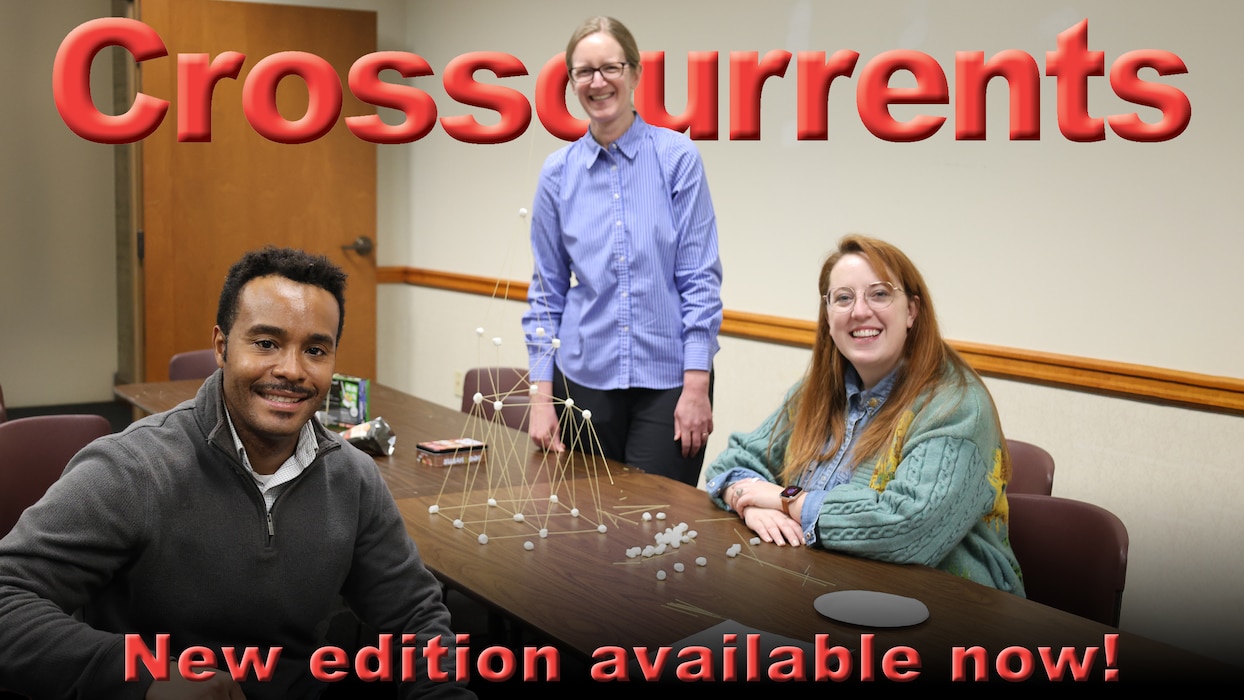 A graphic showing a man and two women at a table with a tower of angel hair pasta and marshmallows. They all smile at the camera. The text reads "Crosscurrents, New edition available now!"