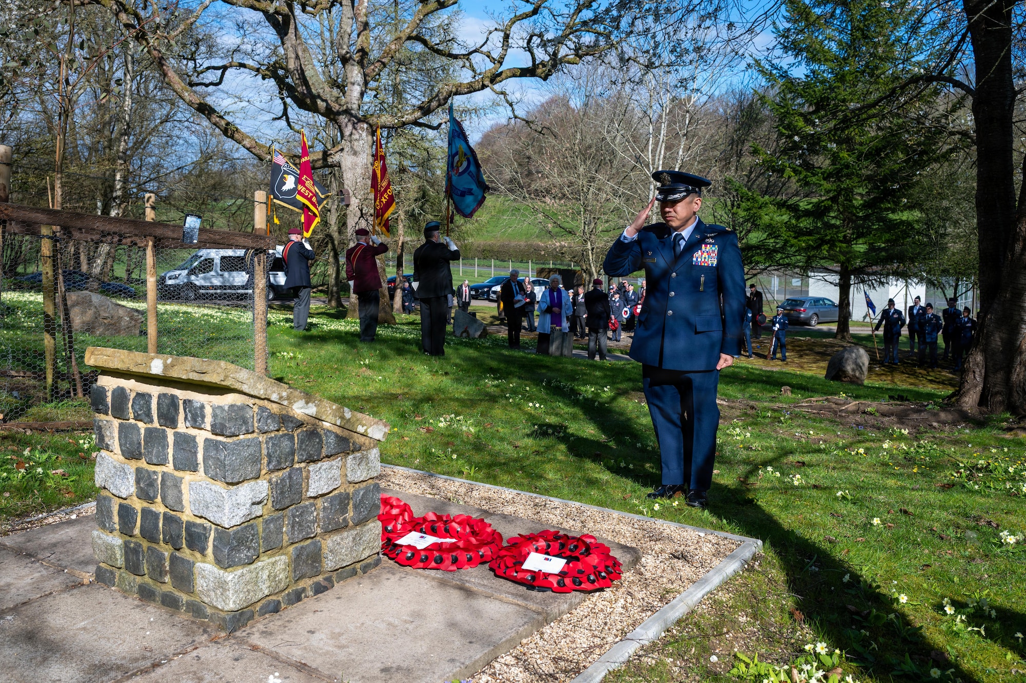 An USAF officer renders a salute during a memorial service