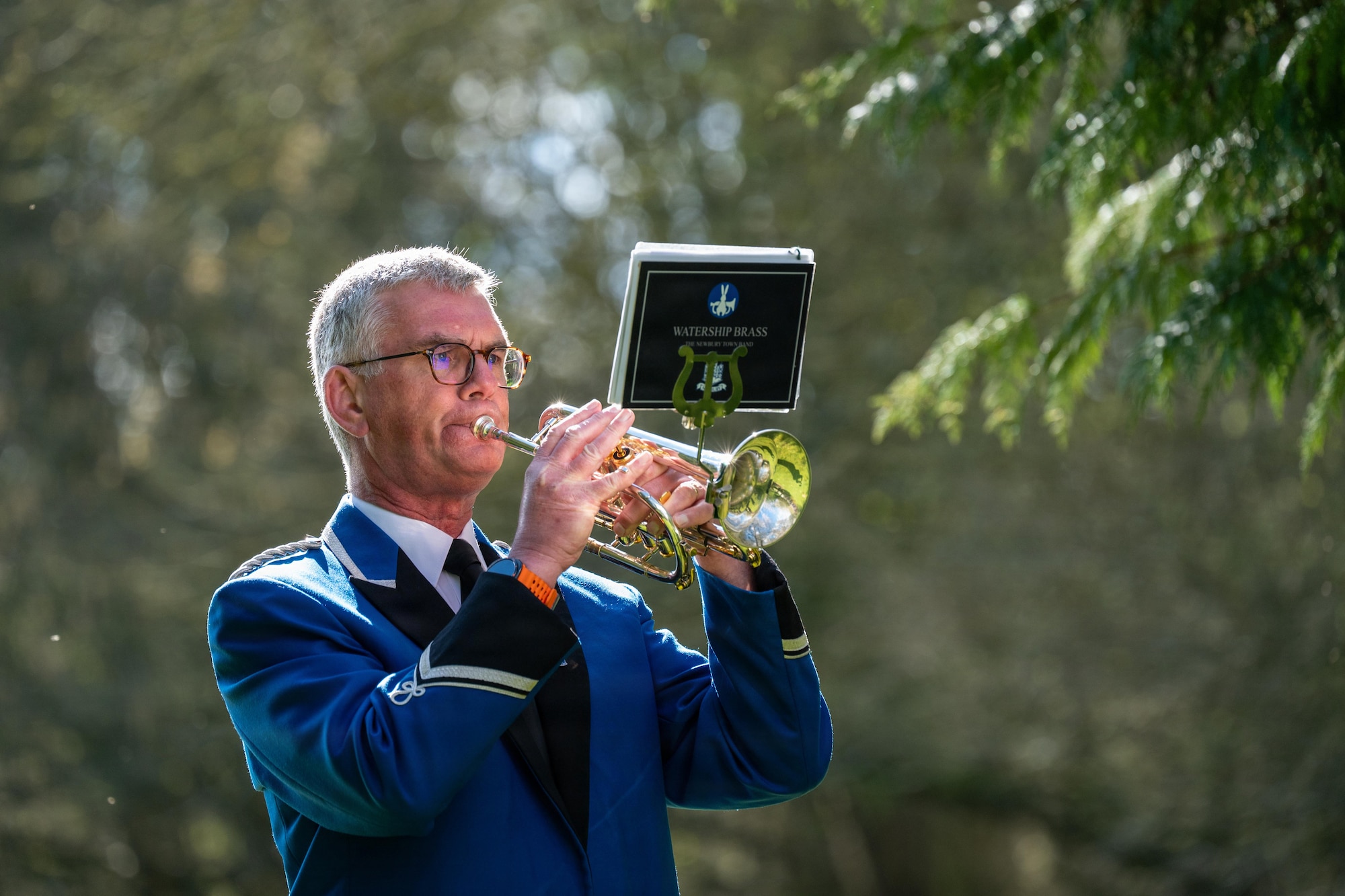 A bugler sounds the last post during a memorial service
