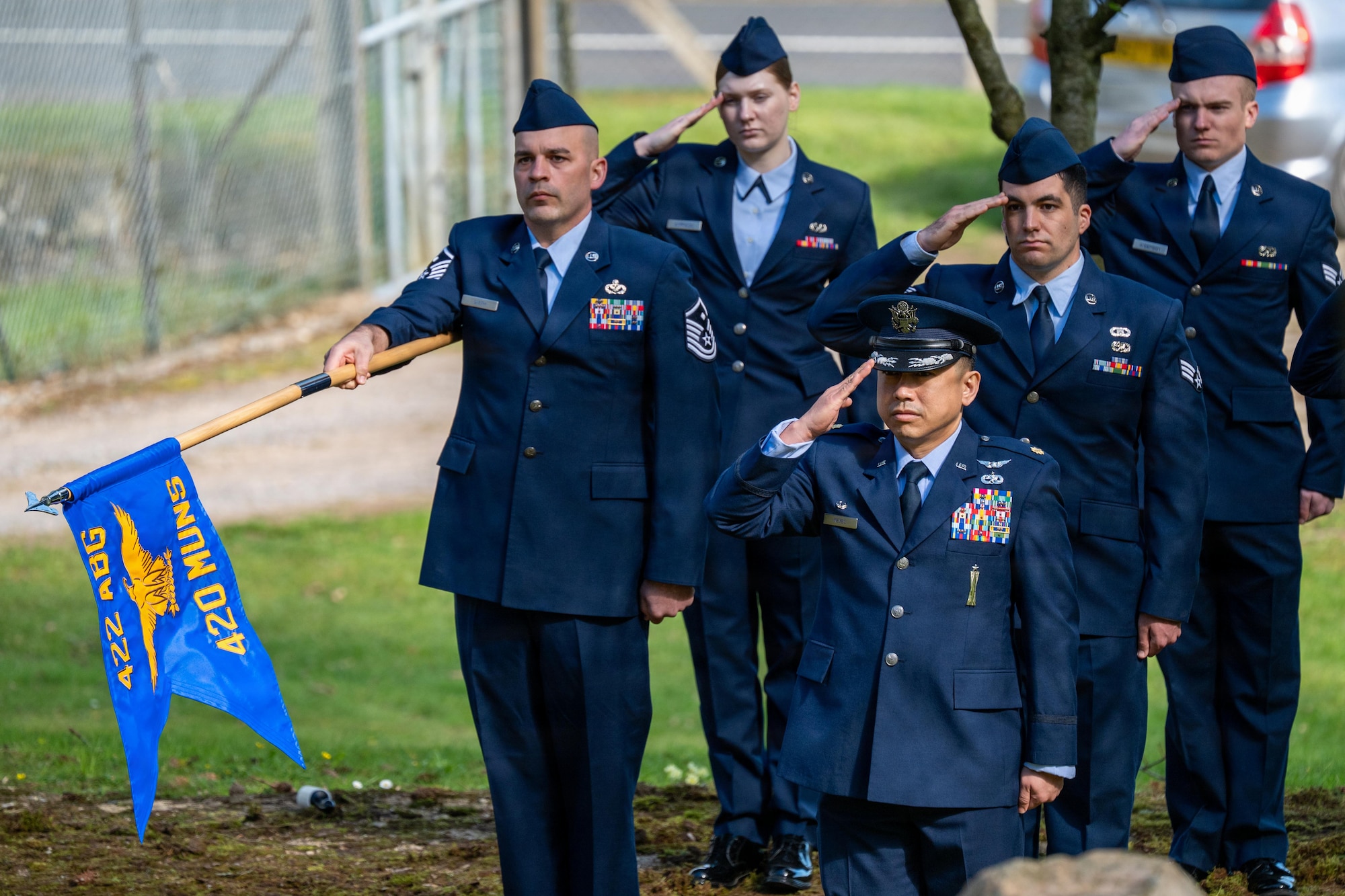 Airmen render salutes