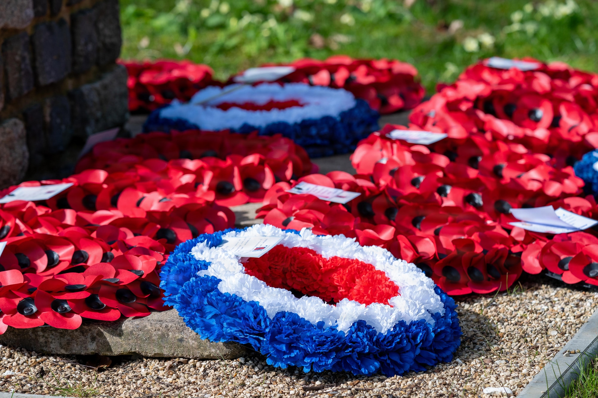 Wreaths rest at the base of the Lancaster crew’s permanent memorial