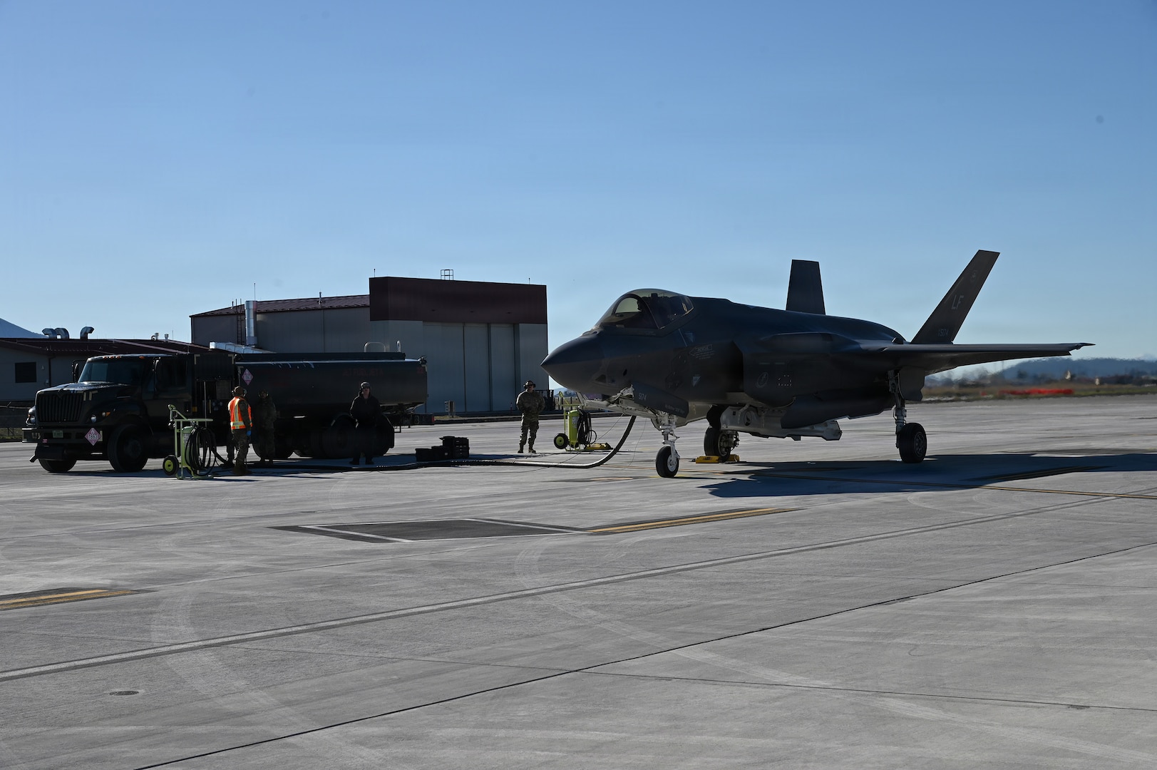 Members of the 173rd Fighter Wing practice hot pit procedures on the F-35 Lightning II with pilots from the 56th Fighter Wing out of Tucson, Arizona, April 3, 2026, at Kingsley Field, Oregon.