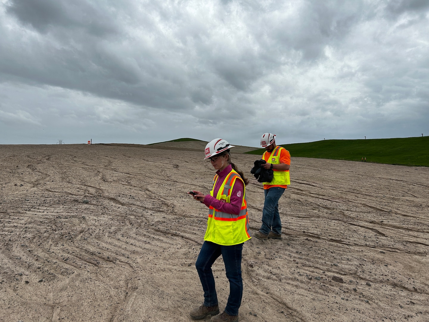 Engineered cap inspection by two Buffalo District engineers.