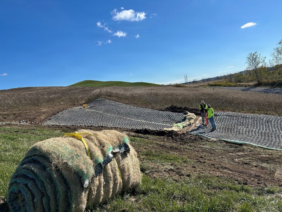 Restoration activities including drainage measures and installing erosion control bio-fabric.